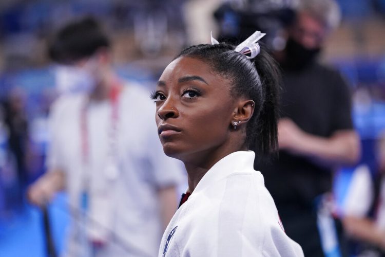Olympic champ Biles out of team finals with apparent injury